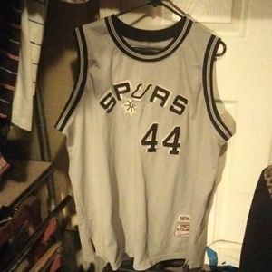 George girvin 1974-75 through back jersey by Mitchell and ness